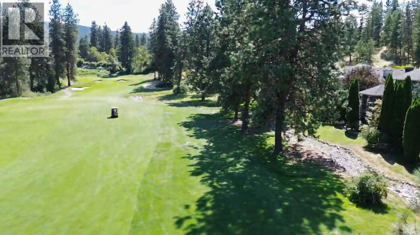 property is on the right in the photo. - 3897 Gallaghers Grange, Kelowna, BC - Outdoor With View