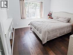 guest bed with custom built in shelving -