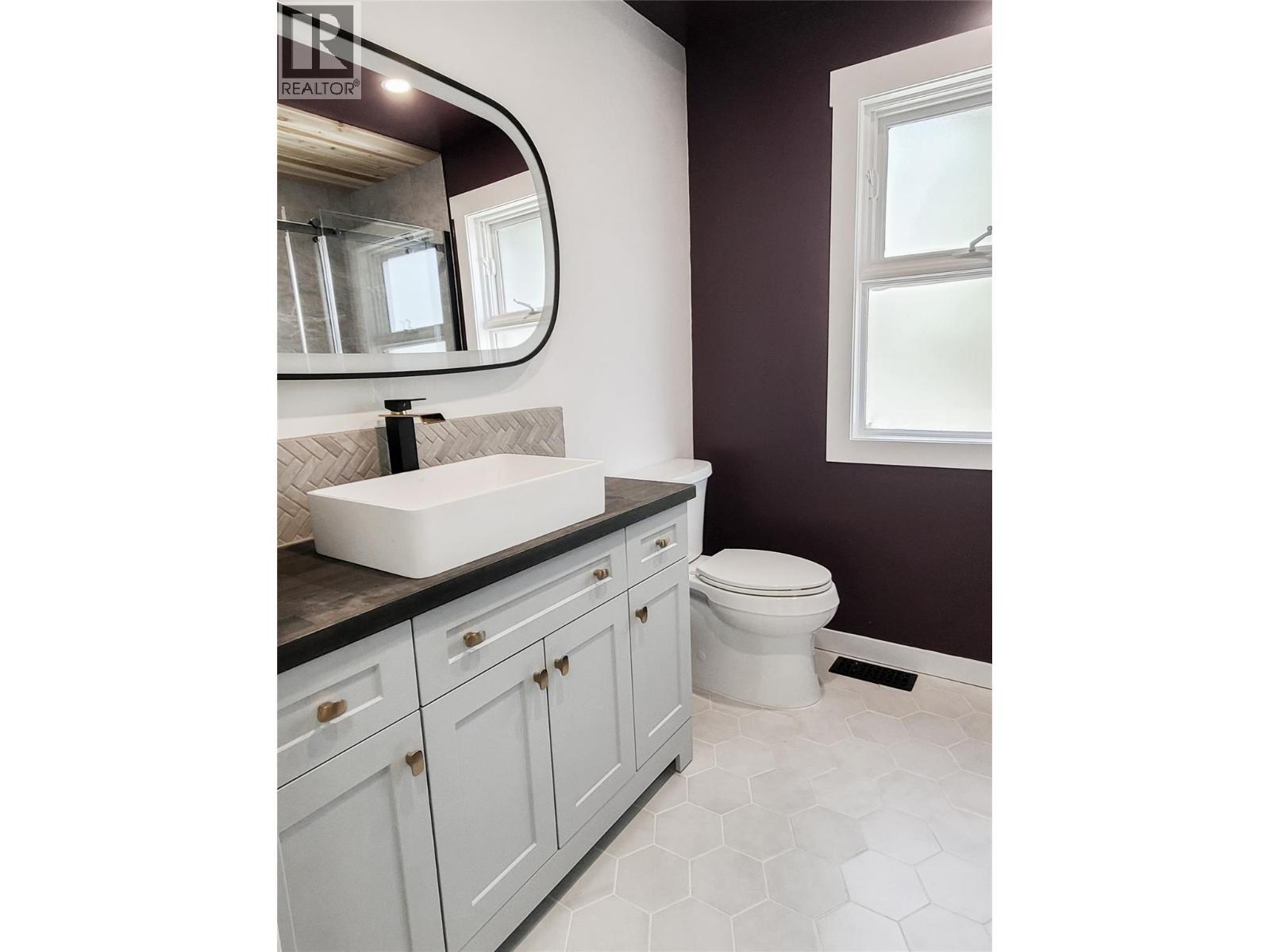 guest bath with led vanity light - 3897 Gallaghers Grange, Kelowna, BC - Indoor Photo Showing Bathroom