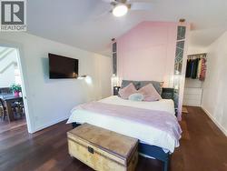 master bed with walk around double entry closet leading to ensuite -