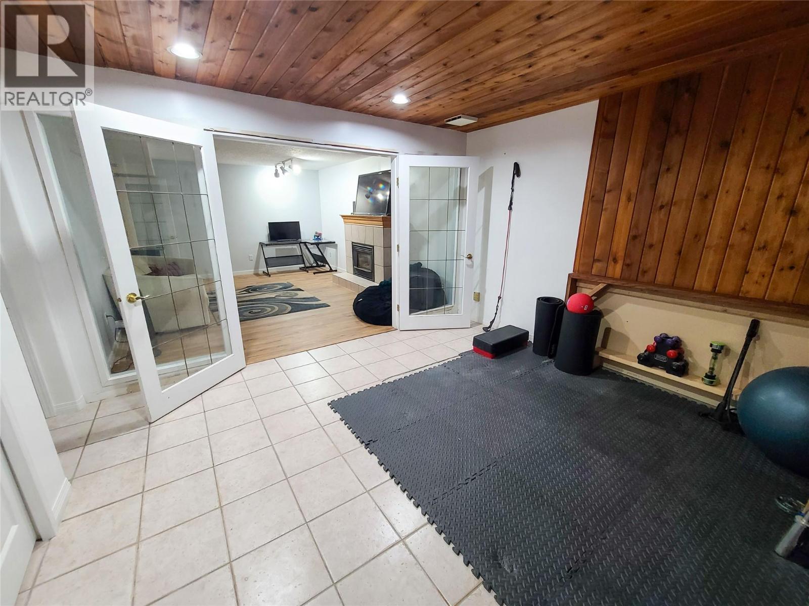 hottub/fitness room, just need your hottub! - 3897 Gallaghers Grange, Kelowna, BC - Indoor Photo Showing Other Room