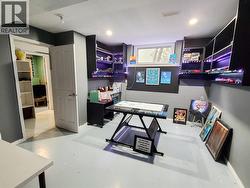 craft and hobby room with its own butler pantry area for easy clean-up, and wine room/sound proof gaming room inside here as well. -