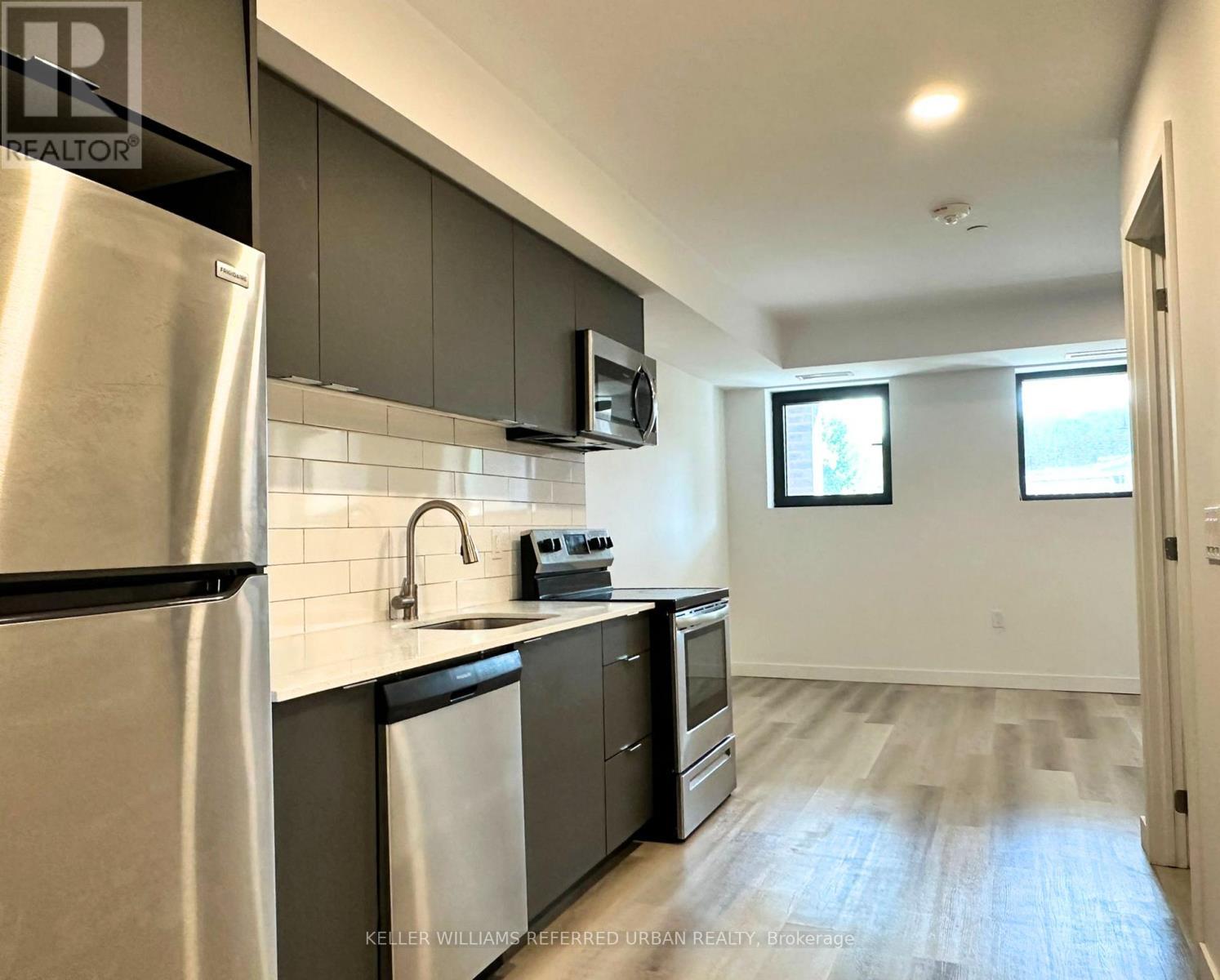 102 - 325 University Avenue, Cobourg, ON - Indoor Photo Showing Kitchen With Stainless Steel Kitchen