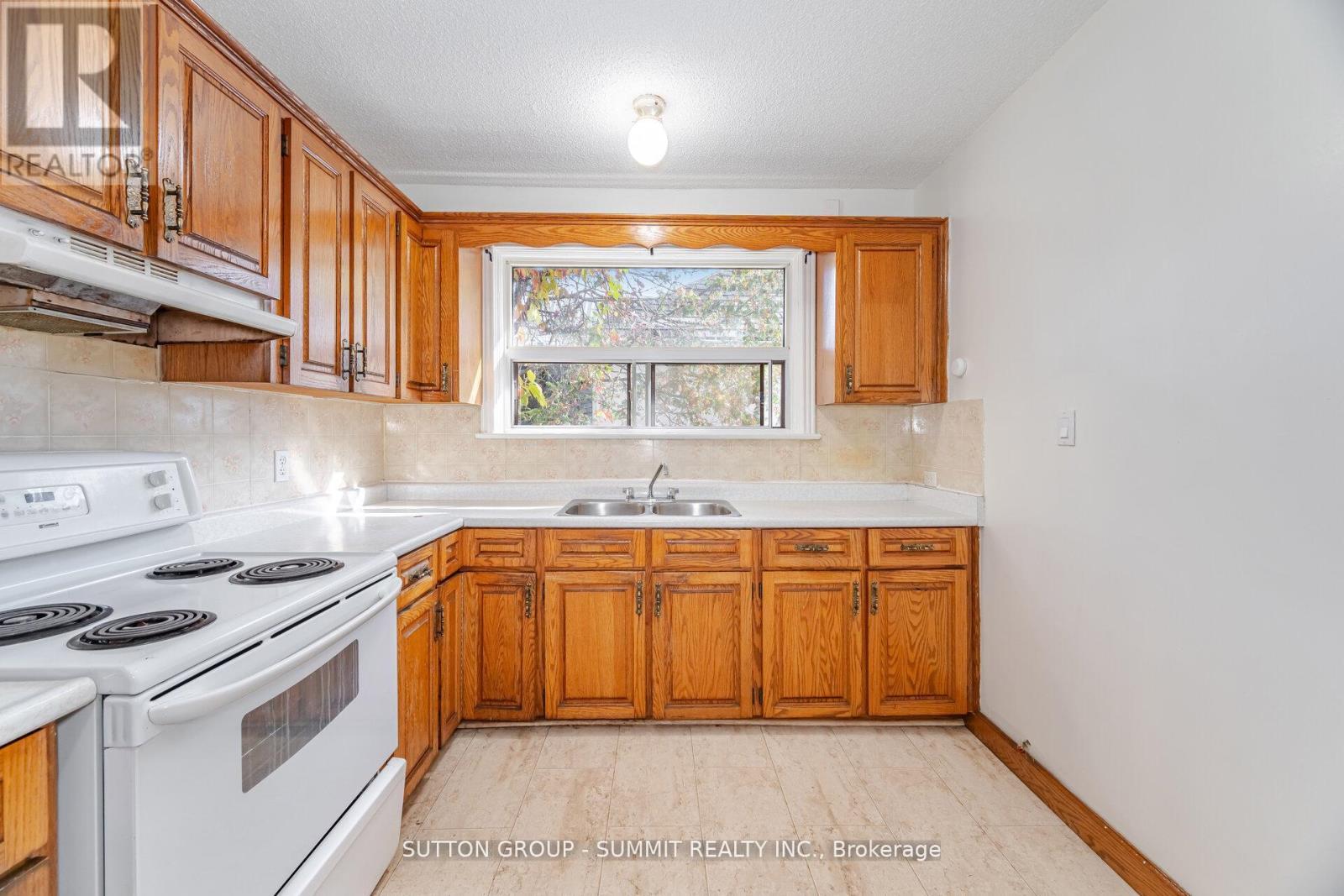56 Ash Crescent, Toronto, ON - Indoor Photo Showing Kitchen With Double Sink