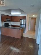 Kitchen and Foyer Area -