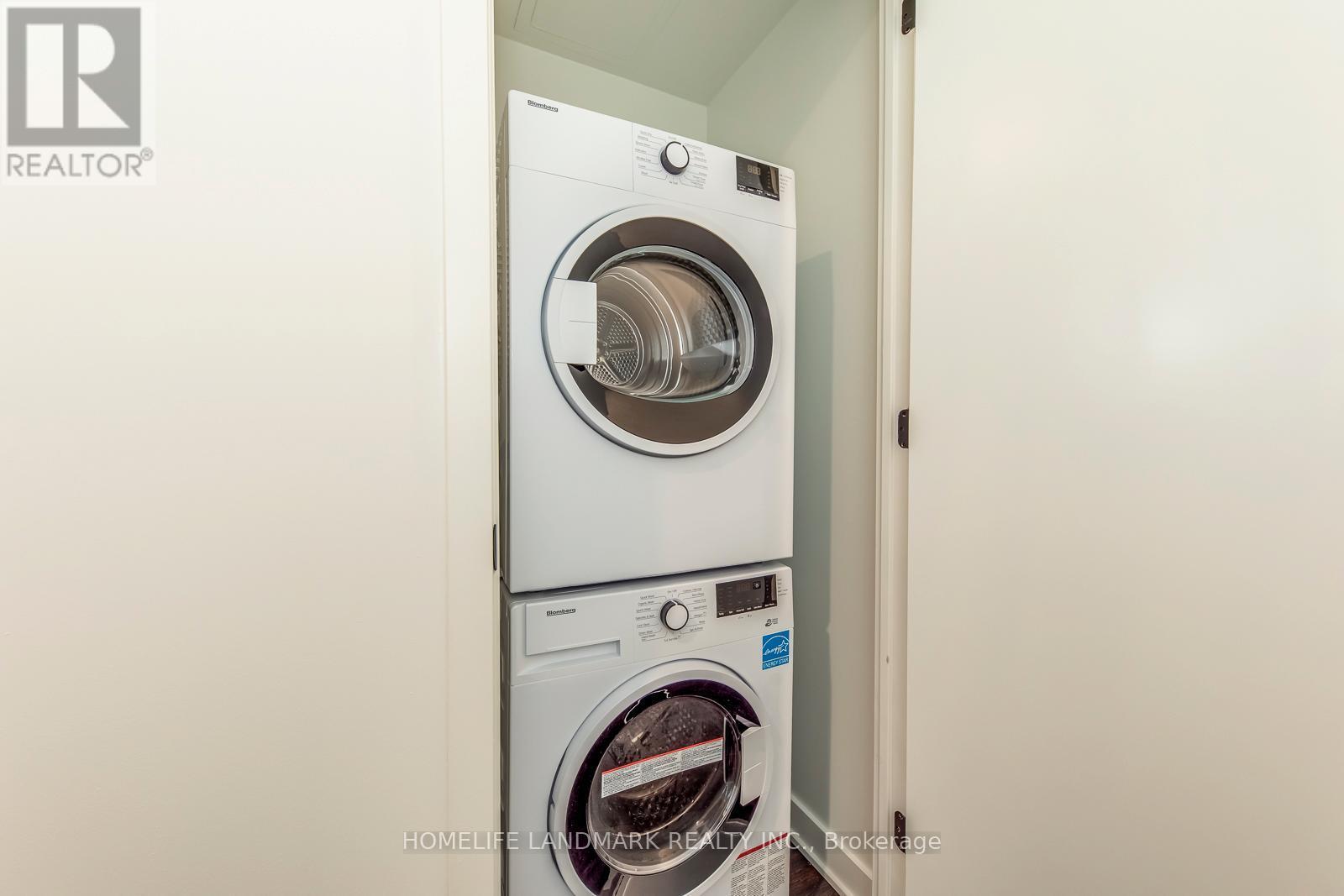 4103 - 55 Charles Street E, Toronto, ON - Indoor Photo Showing Laundry Room