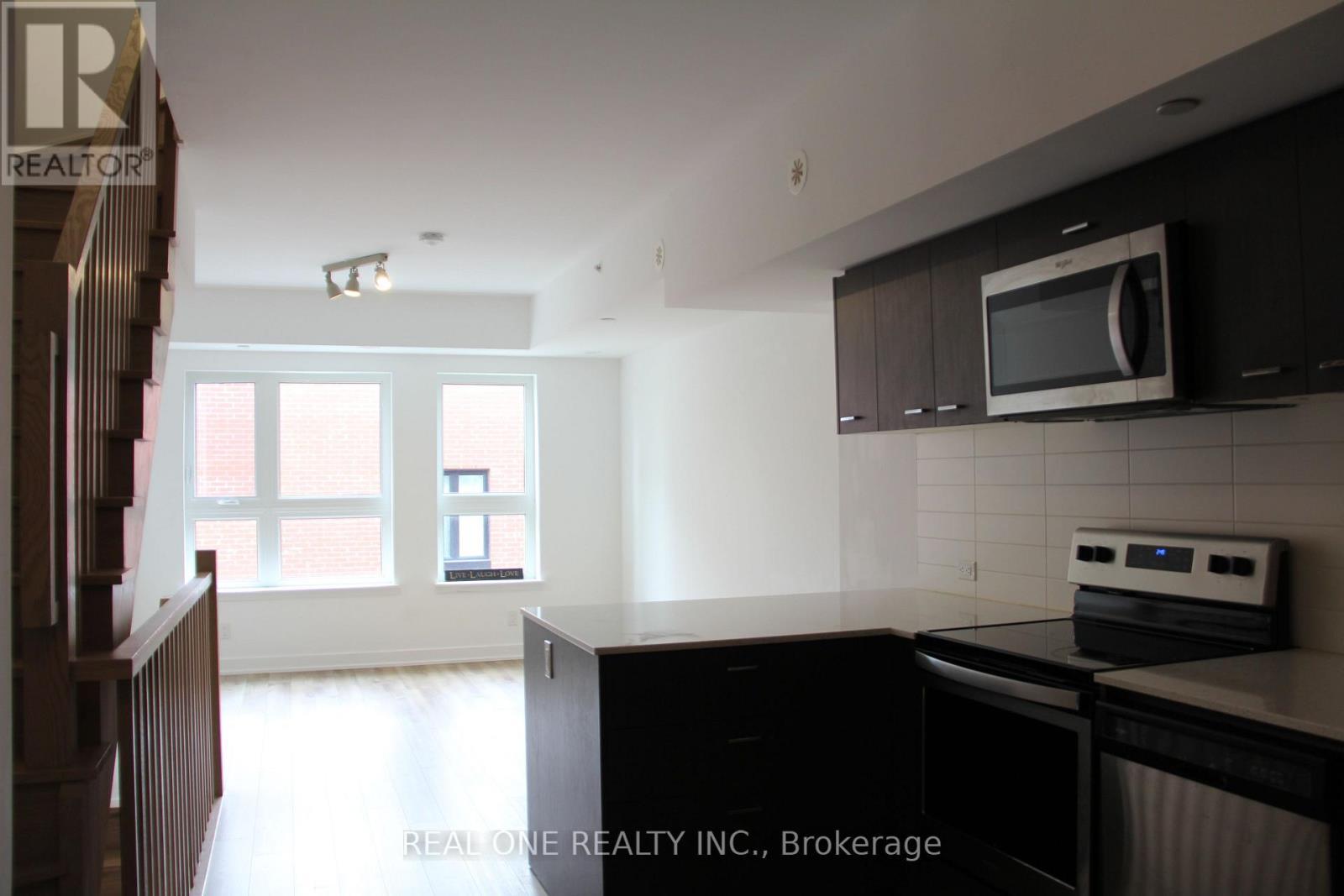 318 - 2100 Bridletowne Circle, Toronto, ON - Indoor Photo Showing Kitchen