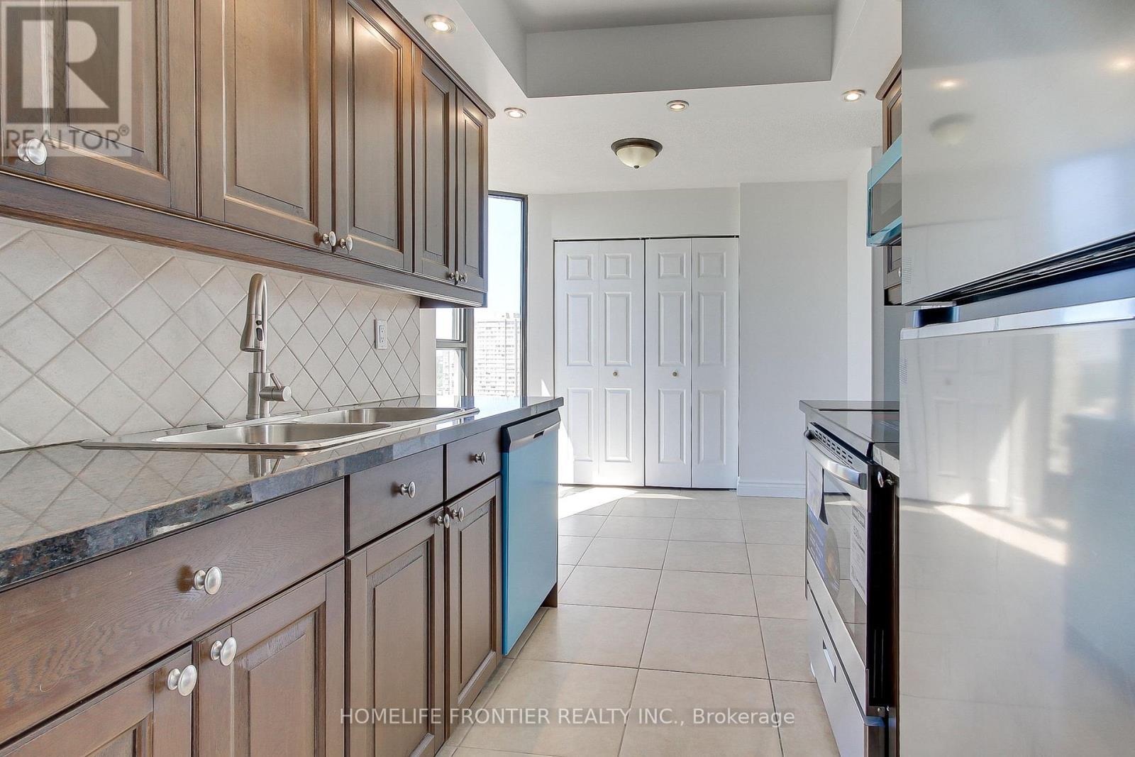 1906 - 80 Antibes Drive, Toronto, ON - Indoor Photo Showing Kitchen With Double Sink With Upgraded Kitchen