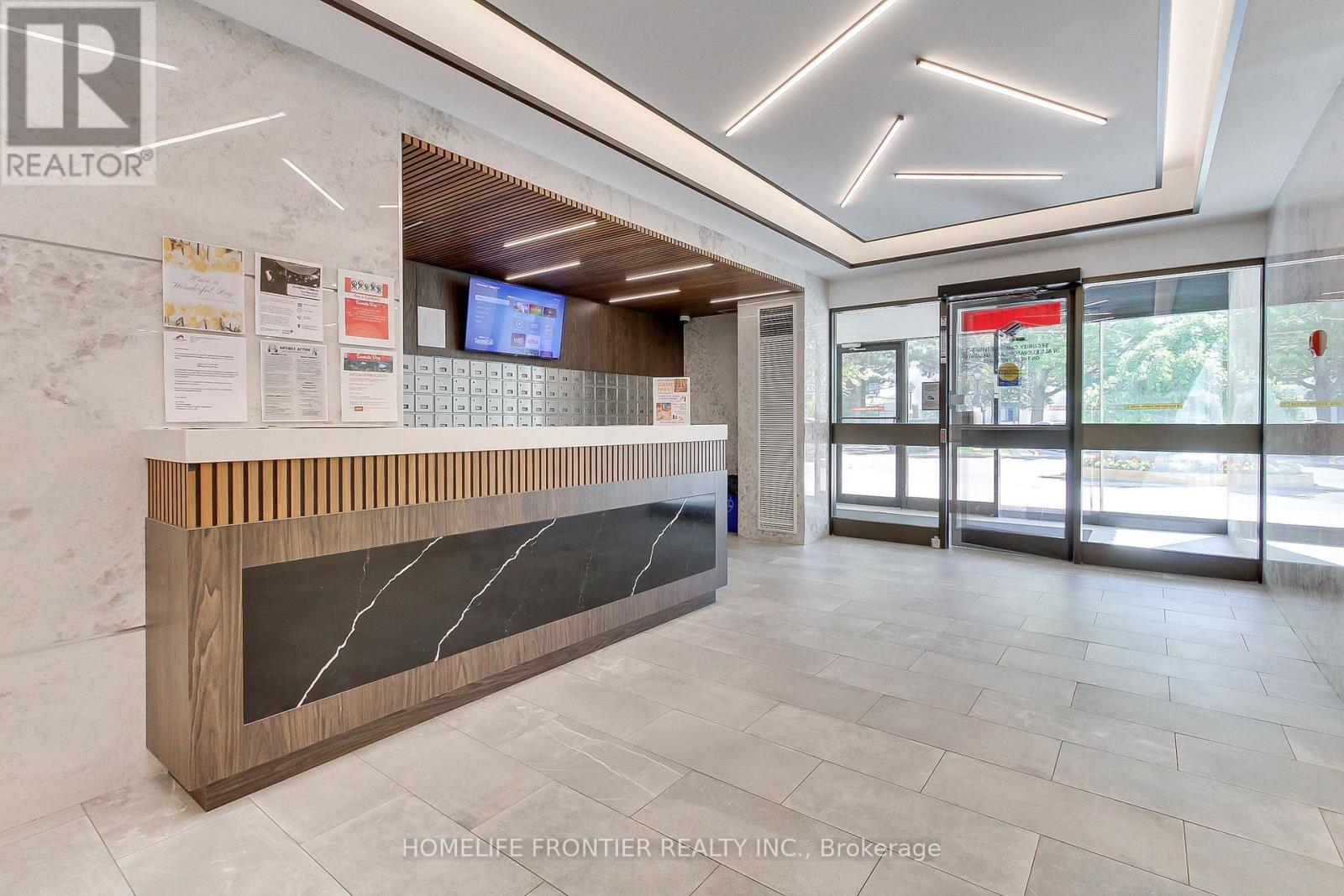 1906 - 80 Antibes Drive, Toronto, ON - Indoor Photo Showing Other Room With Fireplace
