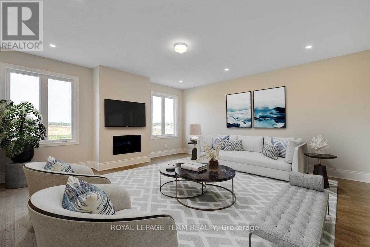 Great room | open to the Kitchen - 1038 Charolais Place, Ottawa, ON - Indoor Photo Showing Living Room With Fireplace