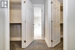 Primary closets - Model home finishes may differ -