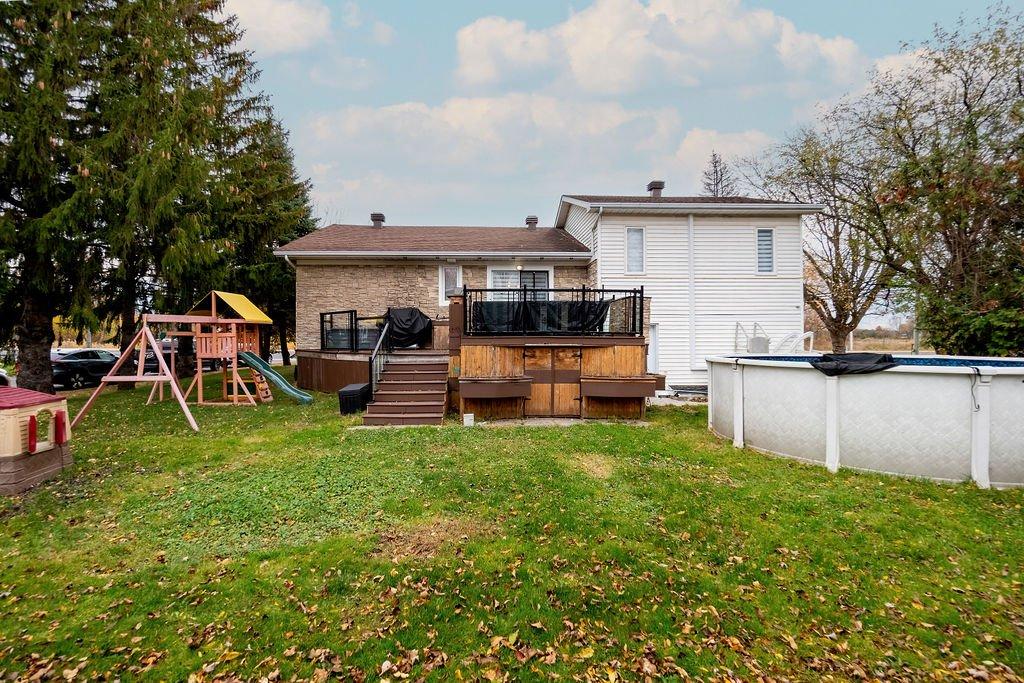 Cour - 2023 Route 133, Saint-Jean-Sur-Richelieu, QC - Outdoor With Above Ground Pool