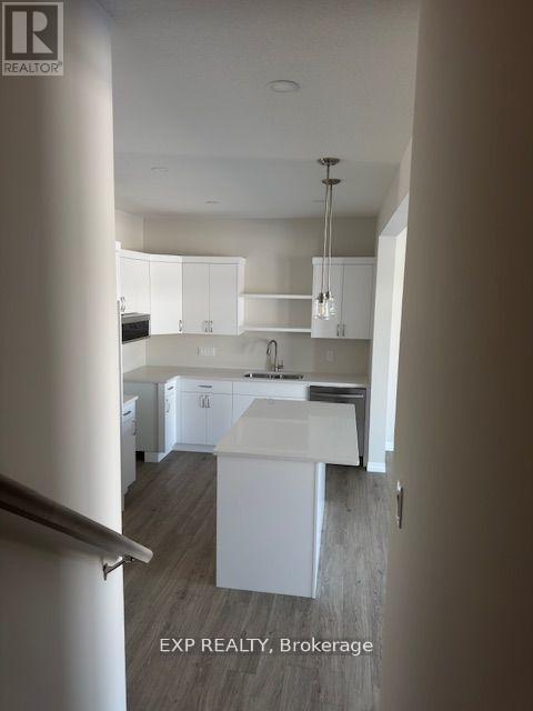 50 Canary Street, Tillsonburg, ON - Indoor Photo Showing Kitchen With Double Sink
