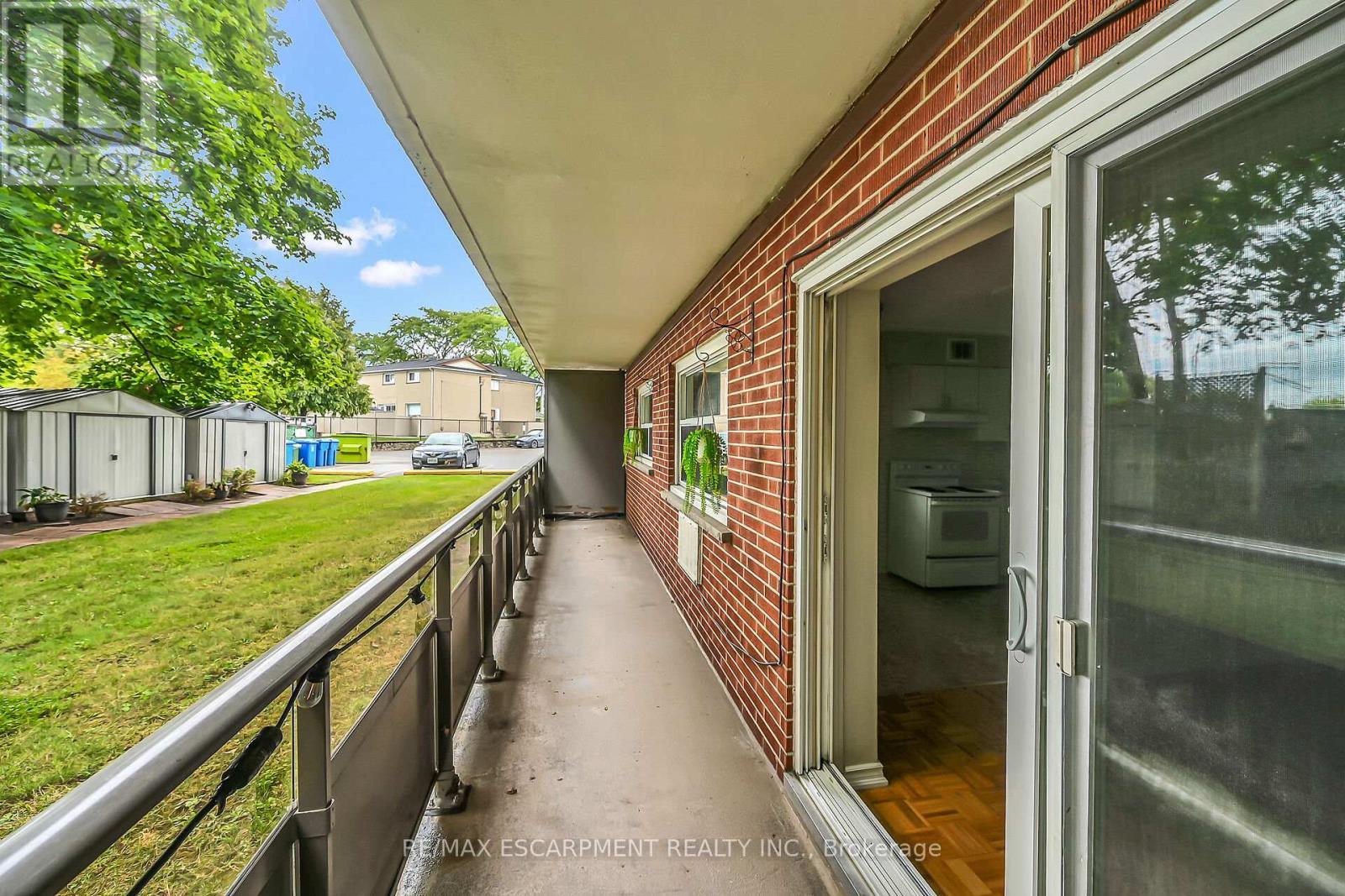 103 - 11 Woodman Drive S, Hamilton, ON - Outdoor With Balcony With Exterior