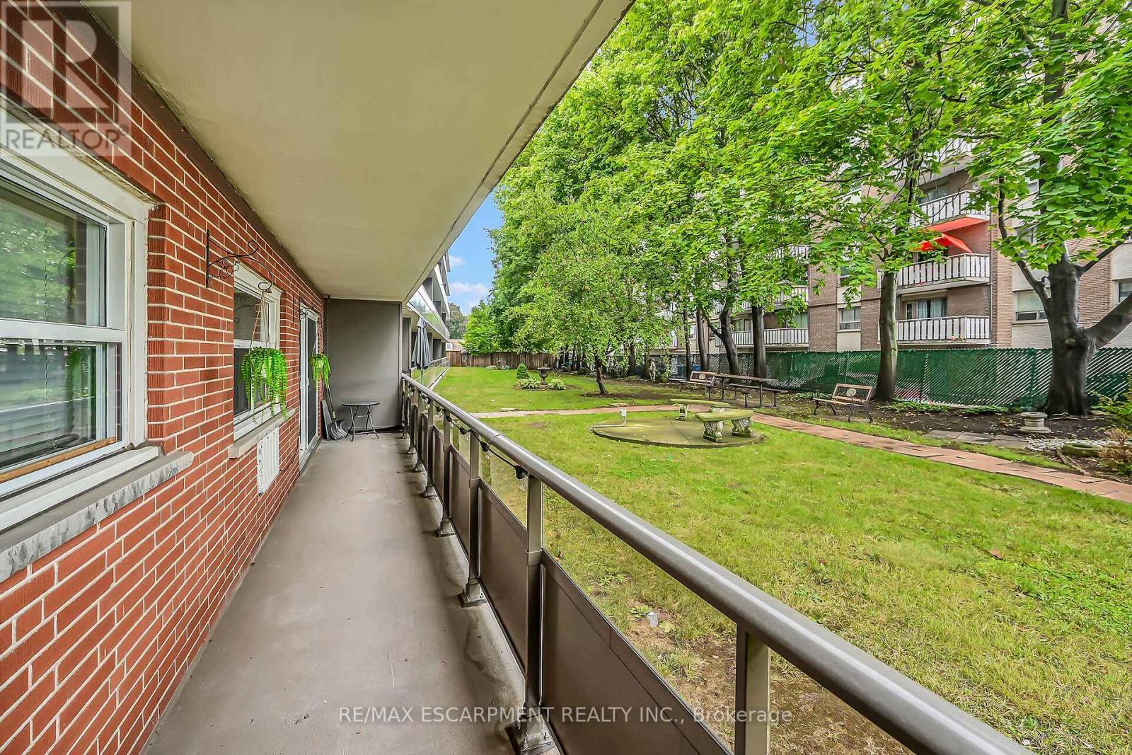 103 - 11 Woodman Drive S, Hamilton, ON - Outdoor With Balcony With Exterior