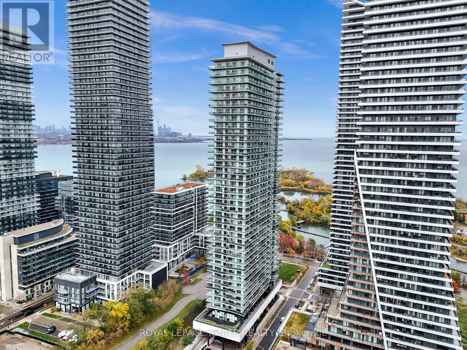 607 - 33 Shore Breeze Drive, Toronto, ON - Outdoor With Facade