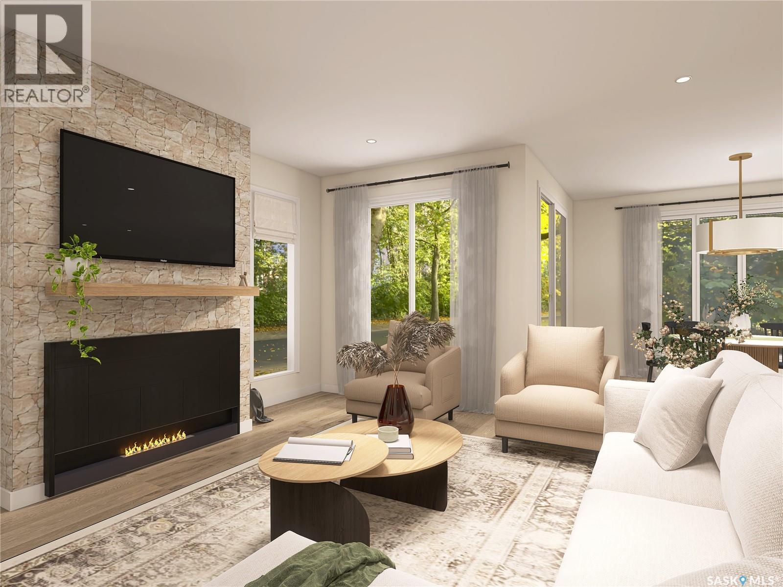 13 Sunterra Drive, Shields, SK - Indoor Photo Showing Living Room With Fireplace