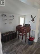 Dining space featuring dark wood-style floors -