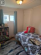 Bedroom with crown molding -