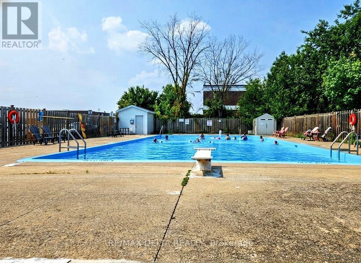 101A - 2044 Arrowsmith Drive, Ottawa, ON - Outdoor With In Ground Pool With Backyard