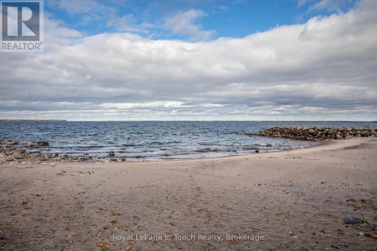 Sandy Beach. Minutes Away - 2 Coppercliff Crescent, Tiny, ON - Outdoor With Body Of Water With View