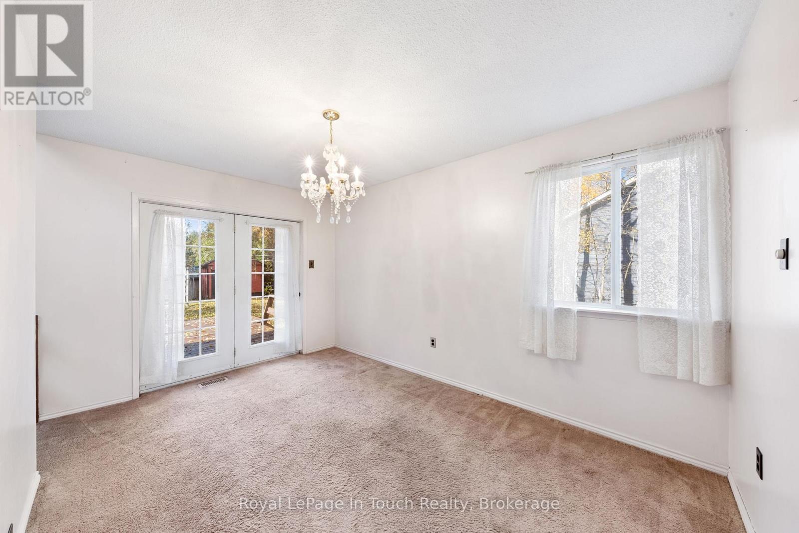 Separate Dining Area - 2 Coppercliff Crescent, Tiny, ON - Indoor Photo Showing Other Room