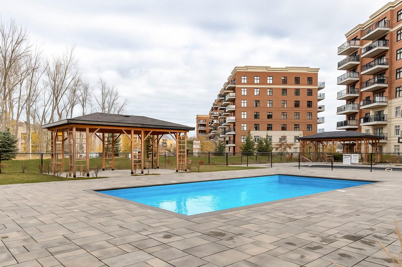 Pool - 406-9175 Rue Lennon, Brossard, QC - Outdoor With In Ground Pool