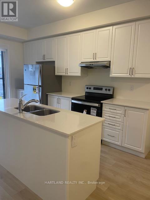 1407 - 1695 Dersan Street, Pickering, ON - Indoor Photo Showing Kitchen With Double Sink
