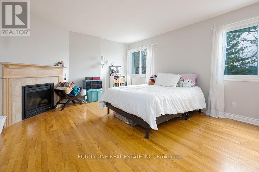 2557 Flannery Drive, Ottawa, ON - Indoor Photo Showing Bedroom With Fireplace