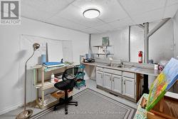 Lower level craft room. -