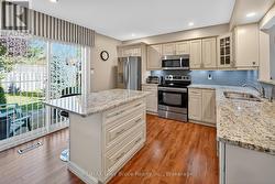 Professionally designed with granite counters. -