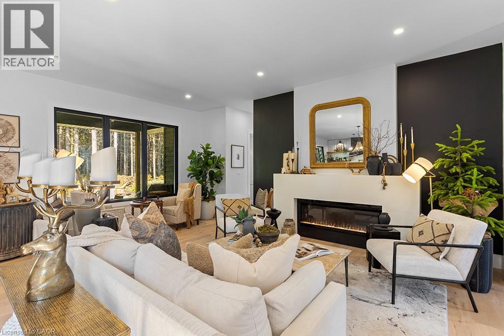 107 Louise Creek Crescent, Elmwood, ON - Indoor Photo Showing Living Room With Fireplace