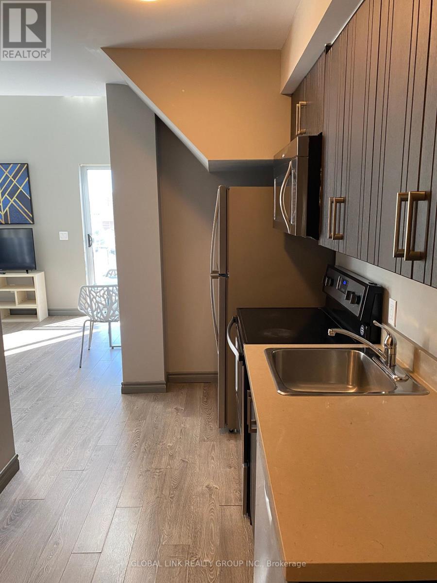 702 - 321 Spruce Street, Waterloo, ON - Indoor Photo Showing Kitchen With Double Sink