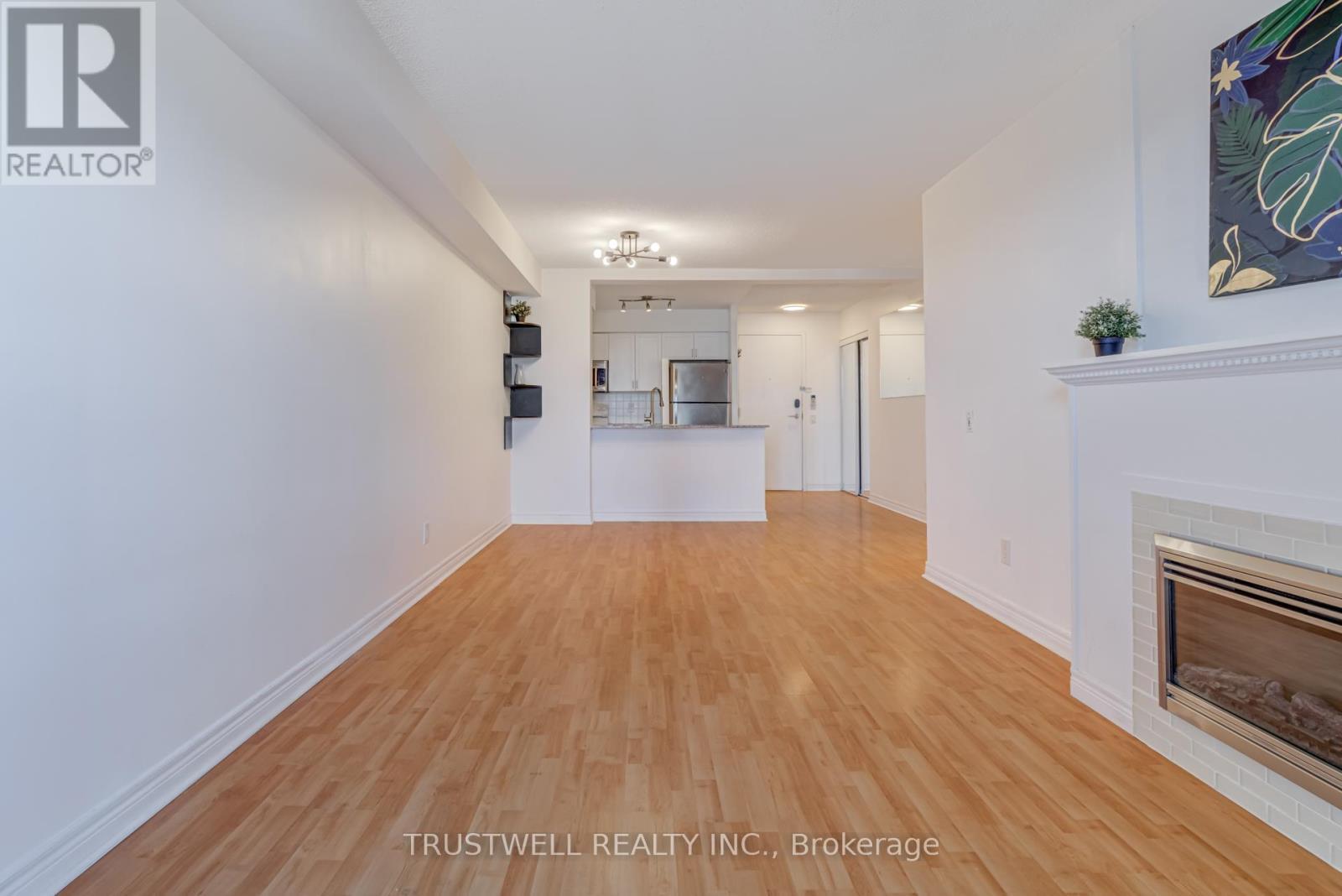 2007 - 83 Borough Drive, Toronto, ON - Indoor With Fireplace