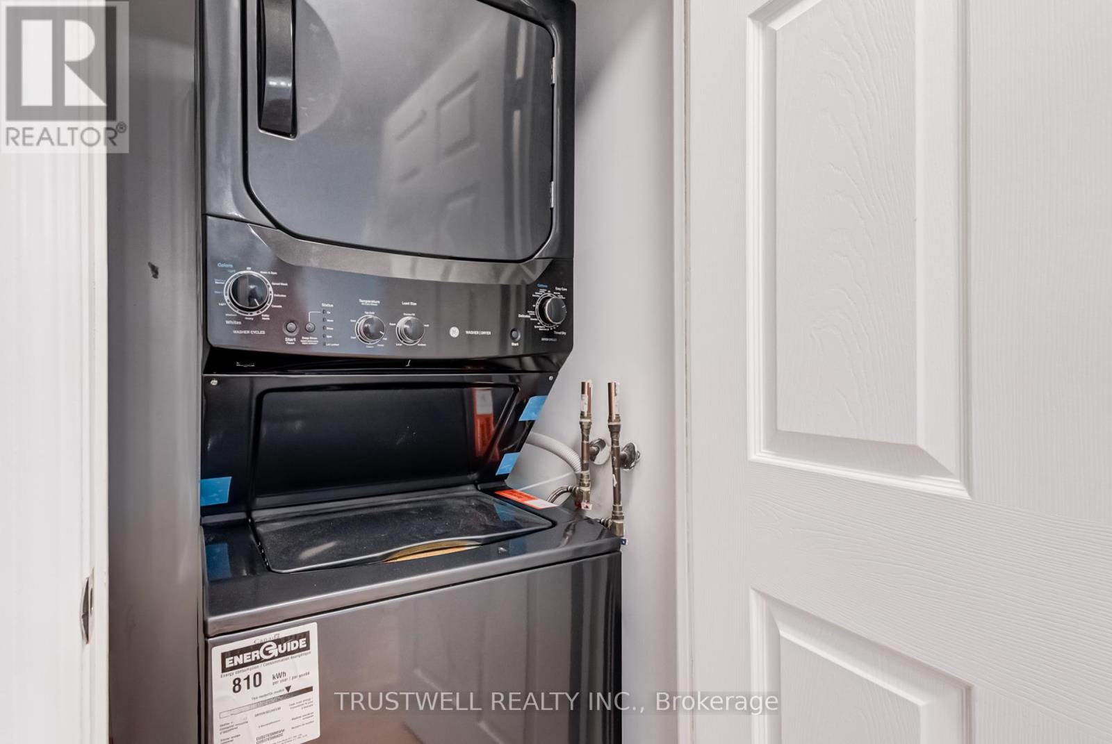 Laundry in Unit - 2007 - 83 Borough Drive, Toronto, ON - Indoor Photo Showing Laundry Room