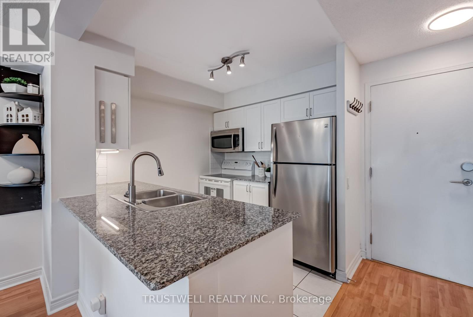 Granite Counters in the Kitchen - 2007 - 83 Borough Drive, Toronto, ON - Indoor Photo Showing Kitchen With Double Sink