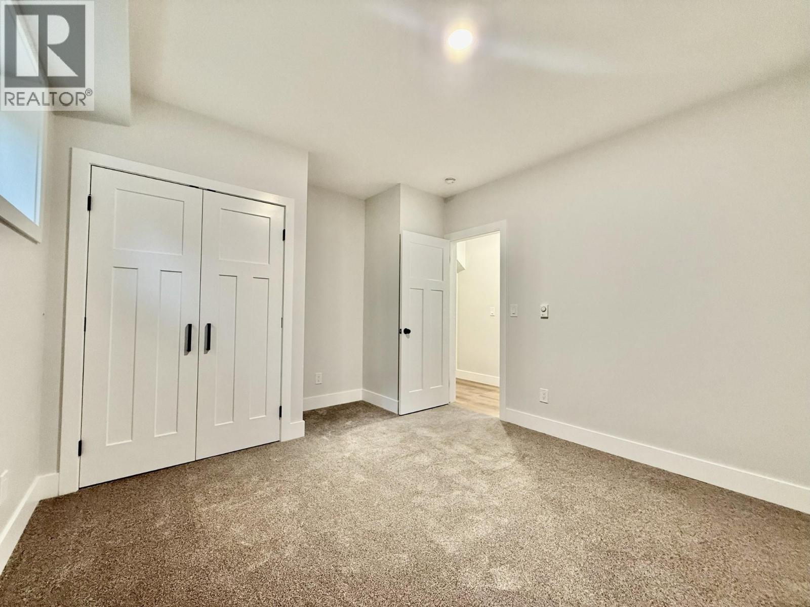 1938 Foxwood Trail Unit# 2, Windermere, BC - Indoor Photo Showing Other Room