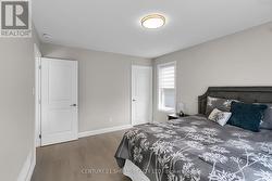 Primary bedroom with walk-in closet -