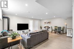 Basement rec room with gas fireplace -