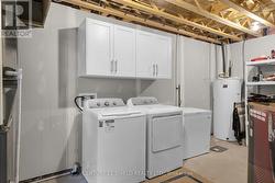 Laundry/storage room in basement -