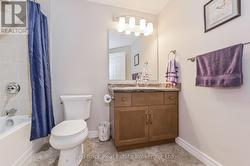 Bathroom with shower / bath combo and vanity -