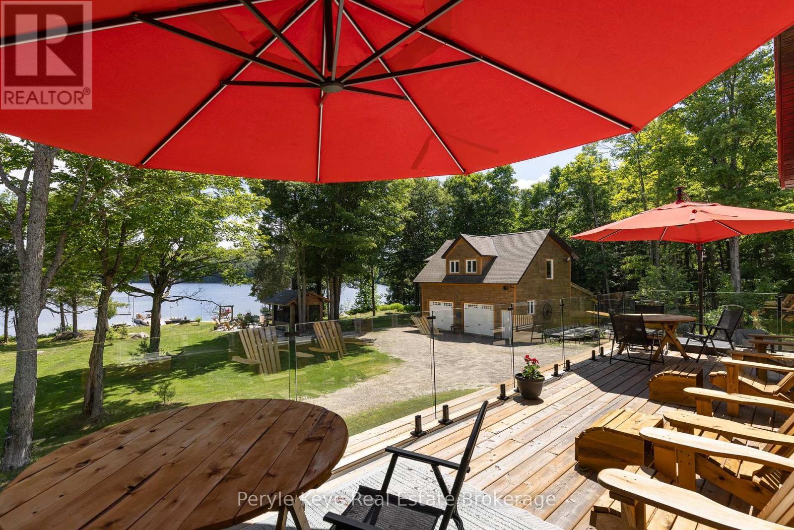 Expansive Wrap Around Deck - 3191 Hwy 518 Highway E, Kearney, ON - Outdoor With Deck Patio Veranda