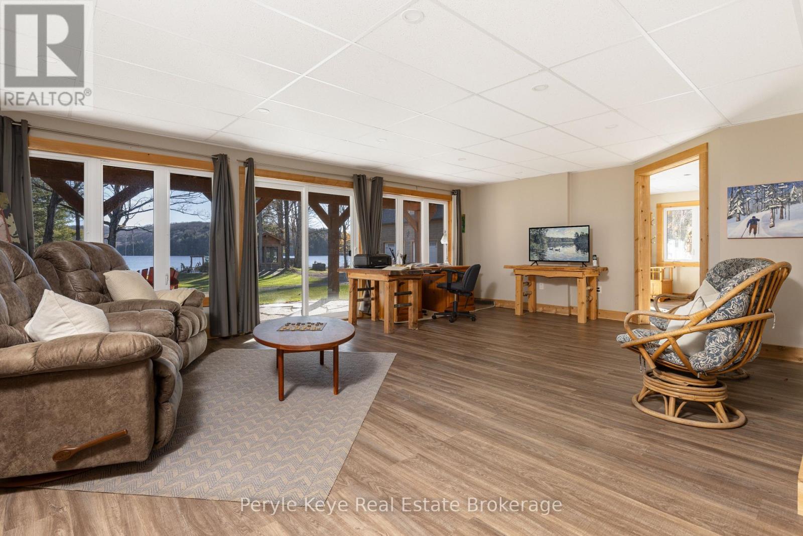 Lower Level Walkout | Many More Photos Available! - 3191 Hwy 518 Highway E, Kearney, ON - Indoor Photo Showing Living Room