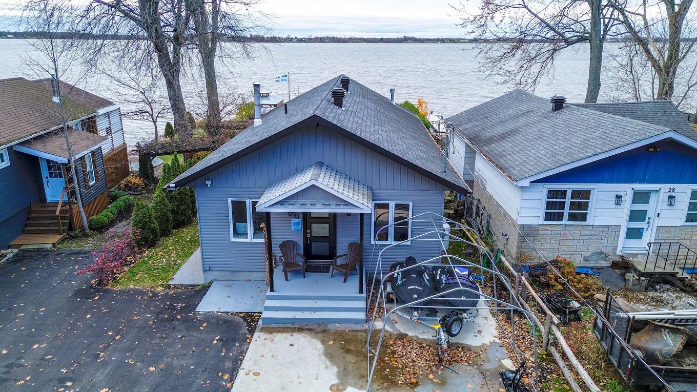 Frontage - 30 Rue Paquette, Grenville-Sur-La-Rouge, QC - Outdoor With Body Of Water With Facade