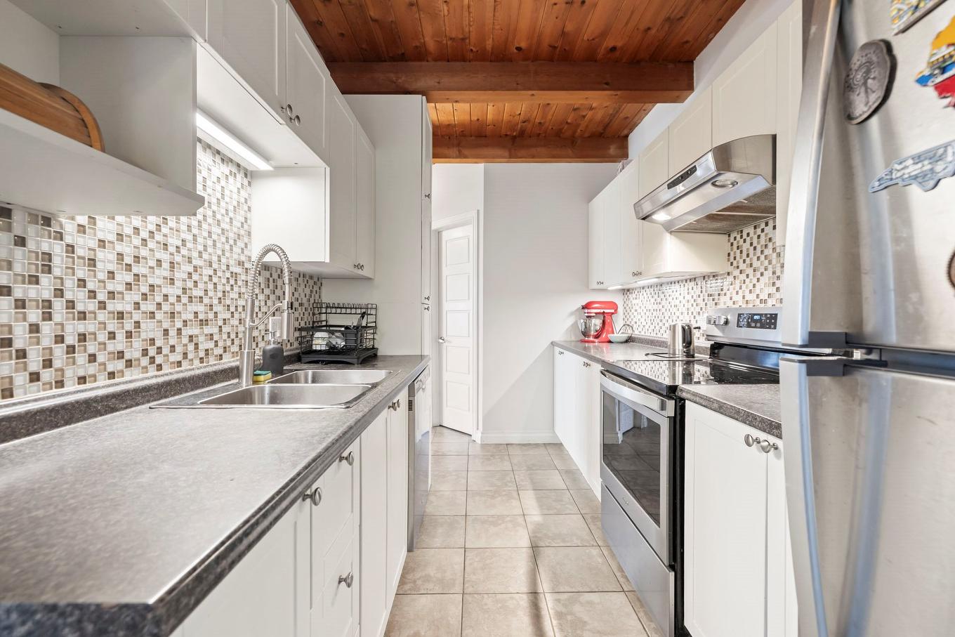 Kitchen - 19 Rue Céline N., Rigaud, QC - Indoor Photo Showing Kitchen With Double Sink