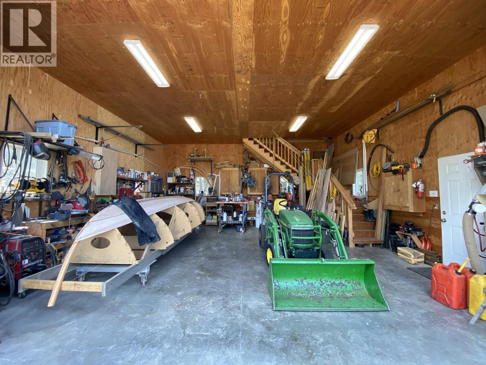 6627 Mcnolty Road, 100 Mile House, BC - Indoor Photo Showing Garage
