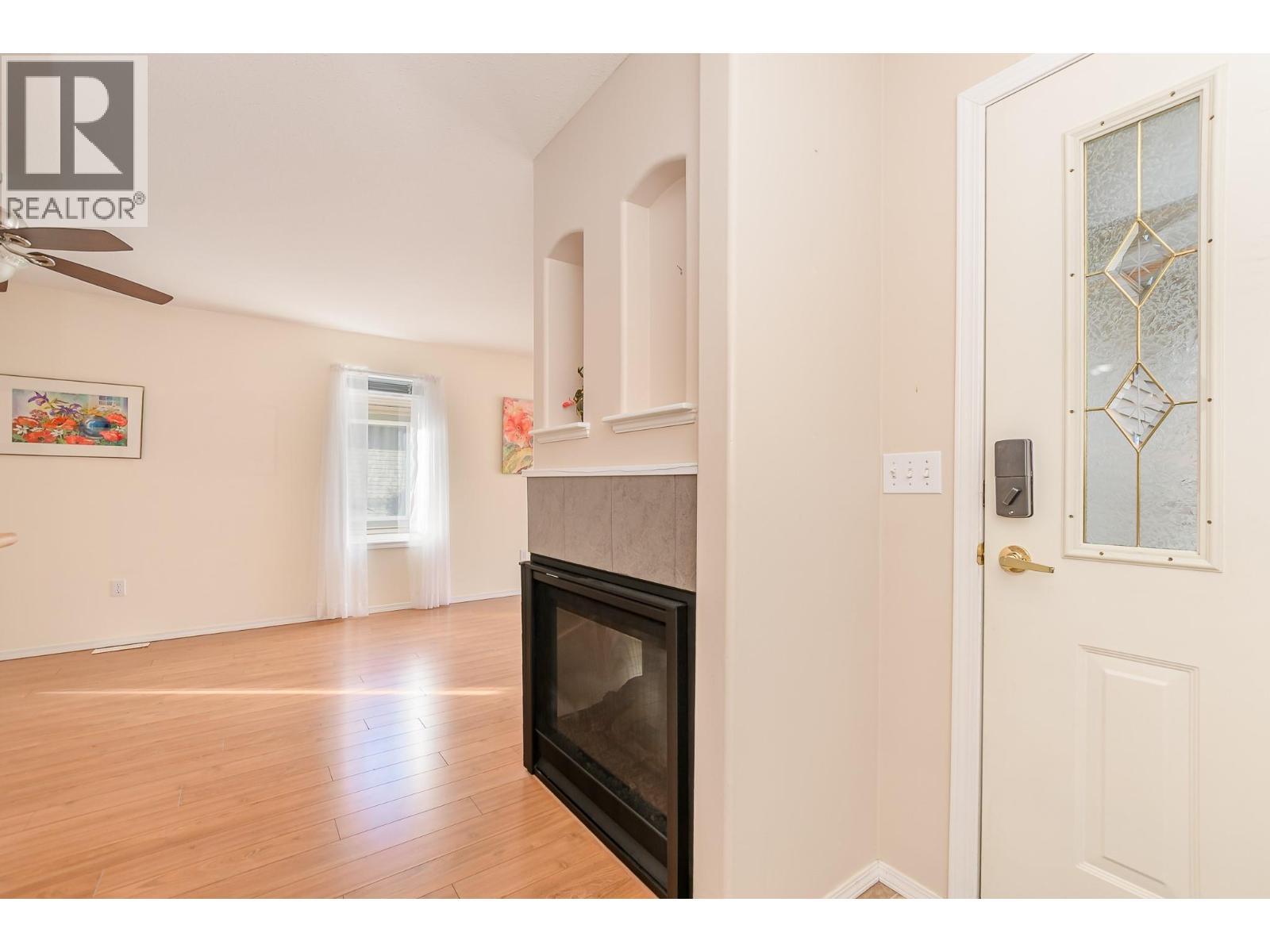 111 Harbourfront Drive Nw Unit# 47, Salmon Arm, BC - Indoor With Fireplace