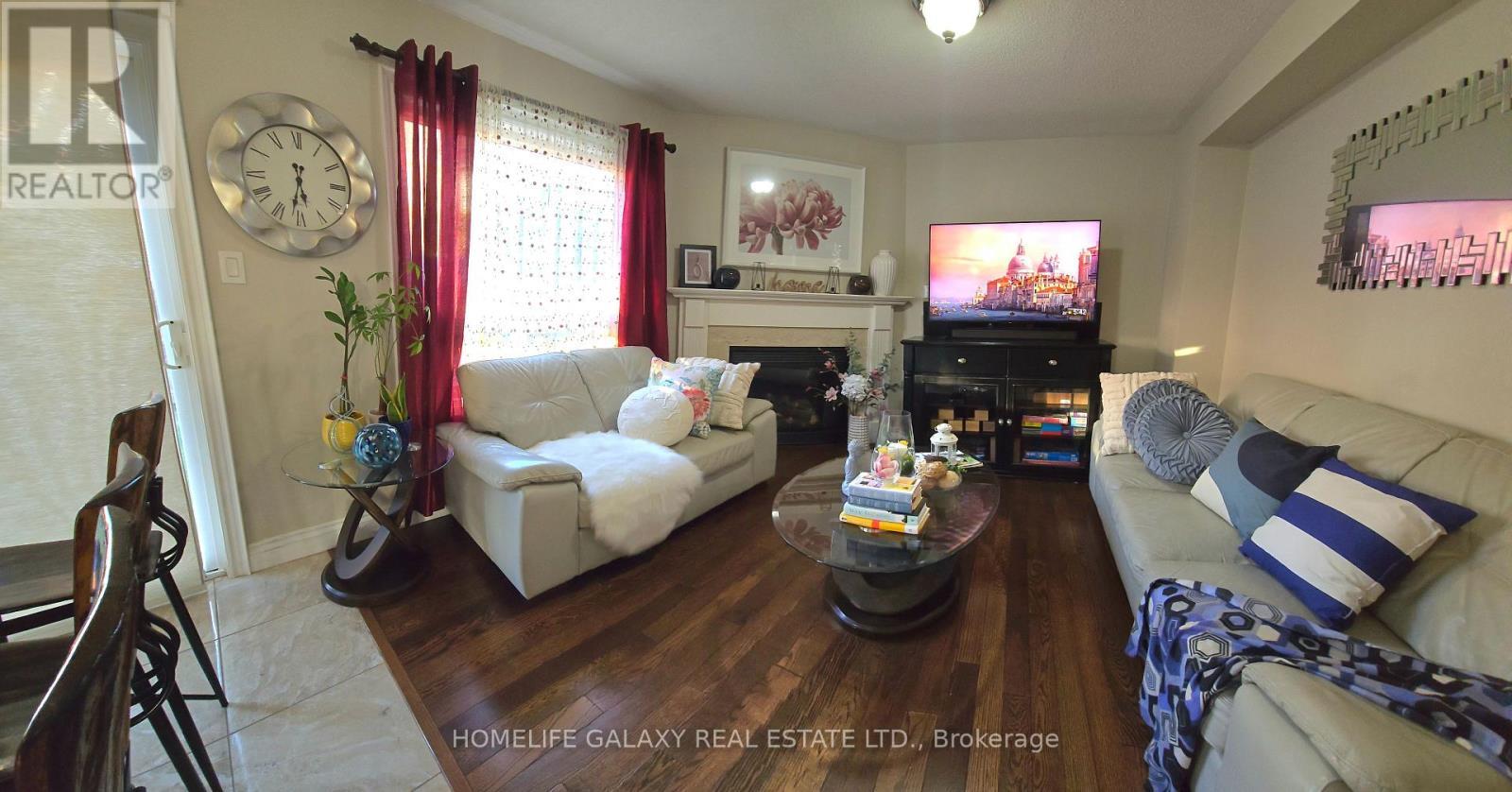 69 Crown Victoria Drive, Brampton, ON - Indoor Photo Showing Other Room With Fireplace