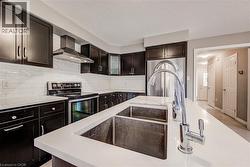 view from island with hard surface counter tops -