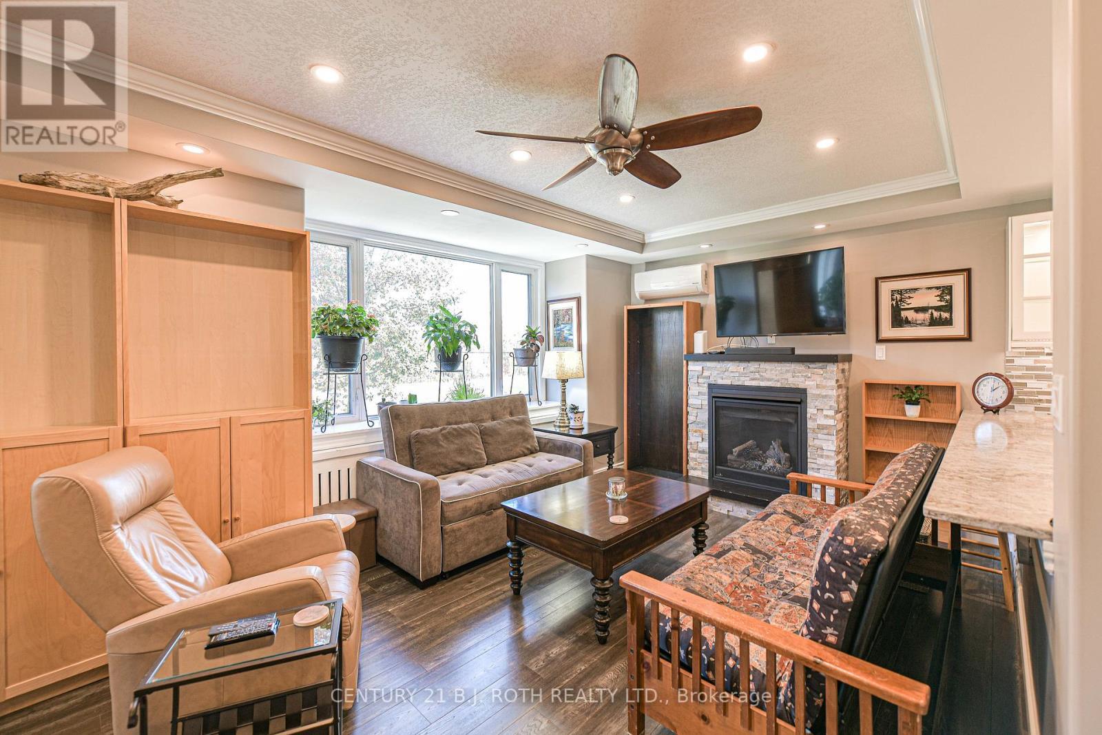 Upper Living Room - 16 First Street, Orillia, ON - Indoor Photo Showing Living Room With Fireplace